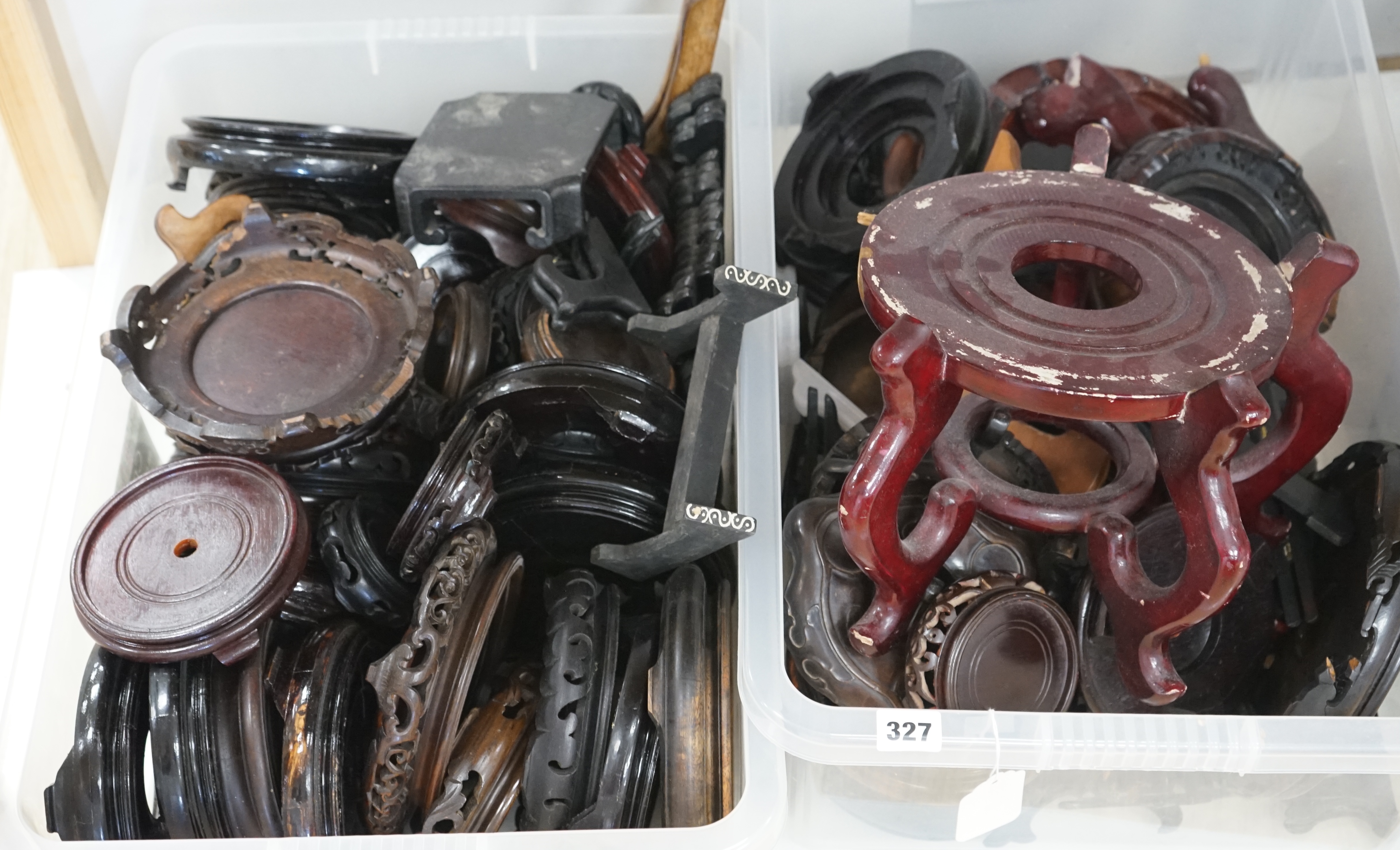 A large collection of Chinese carved hardwood stands, largest 29cm diameter. Condition - varies, poor to fair